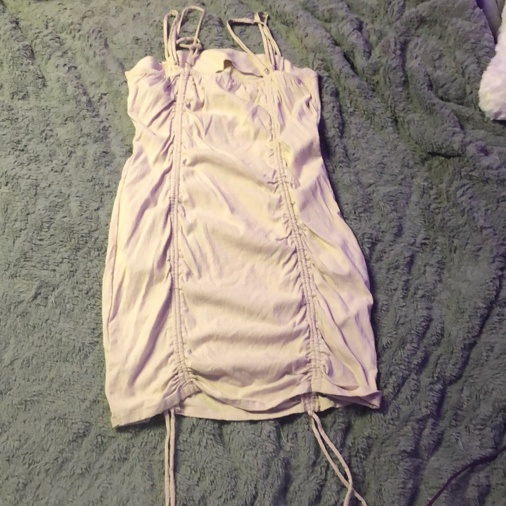 Tan dress, body con, can adjust to how you like, is a medium
